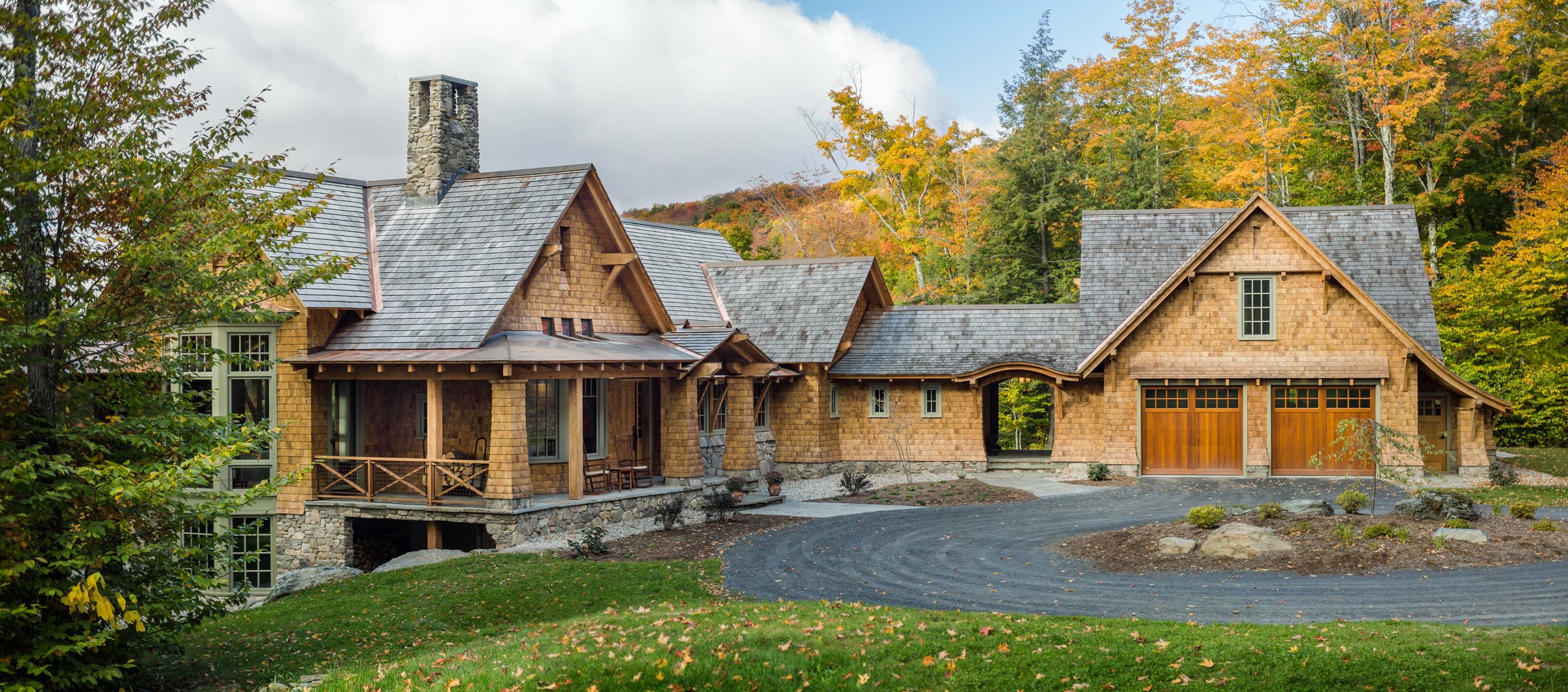 Hollow Residence seen among autumn trees
